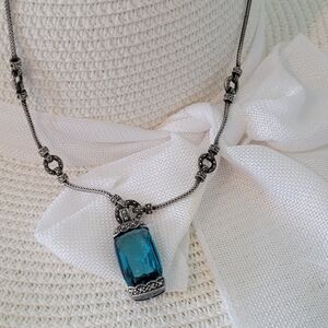Blue crystal on dark silver necklace